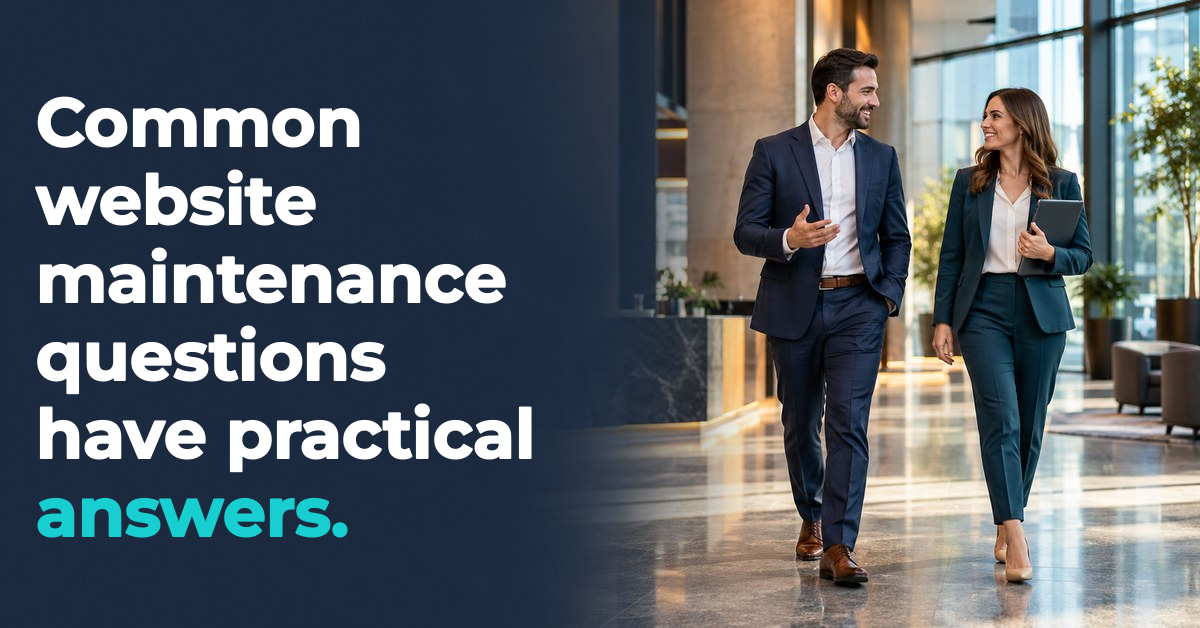 Commercial real estate scene: Two businesspeople walking through an office lobby