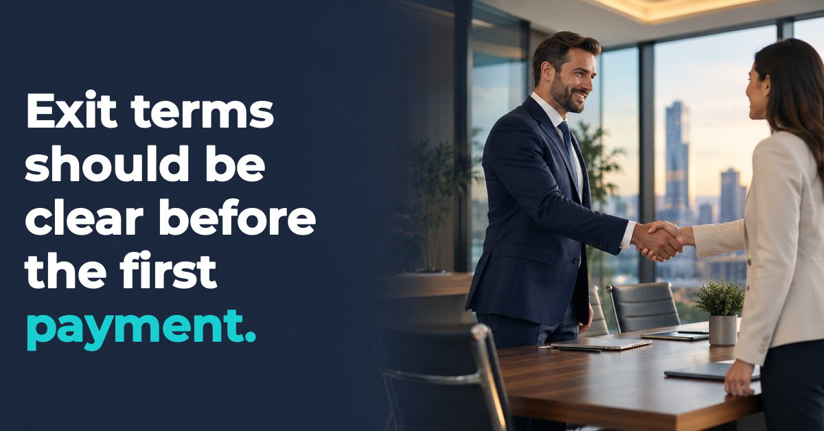 Exit terms should be clear before the first payment. Illustrated a businessperson shaking hands with another person in an office conference room.